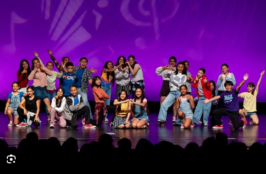 Kids performing hip-hop on stage
